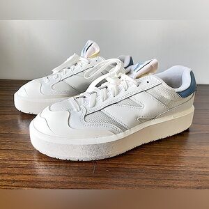 New Balance White and Blue Sneakers